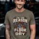 Plumber T‑Shirt – "I'm the Reason Your Floor Is Dry" Vintage Plumbing Tee — army — Model Plumber T‑Shirt – "I'm the Reason Your Floor Is Dry" Vintage Plumbing Tee — army t-shirt, model photo | Pressure Tested Co