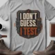 I Don't Guess I Test T-Shirt — Funny Tech Tee for Engineers and Electricians — athletic-heather — Flat-lay I Don't Guess I Test T-Shirt — Funny Tech Tee for Engineers and Electricians — athletic-heather t-shirt, flat-lay product photo | Pressure Tested Co