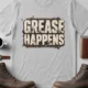 Grease Happens T-Shirt — Funny Mechanic Garage Tee — athletic-heather — Flat-lay Grease Happens T-Shirt — Funny Mechanic Garage Tee — athletic-heather t-shirt, flat-lay product photo | Pressure Tested Co