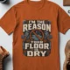 Plumber T‑Shirt – "I'm the Reason Your Floor Is Dry" Vintage Plumbing Tee — autumn — Flat-lay Plumber T‑Shirt – "I'm the Reason Your Floor Is Dry" Vintage Plumbing Tee — autumn t-shirt, flat-lay product photo | Pressure Tested Co