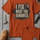 I Fix What You Ignored T-Shirt — Mechanic Wrench Tool Shirt for Technicians & DIYers — autumn — Flat-lay I Fix What You Ignored T-Shirt — Mechanic Wrench Tool Shirt for Technicians & DIYers — autumn t-shirt, flat-lay product photo | Pressure Tested Co