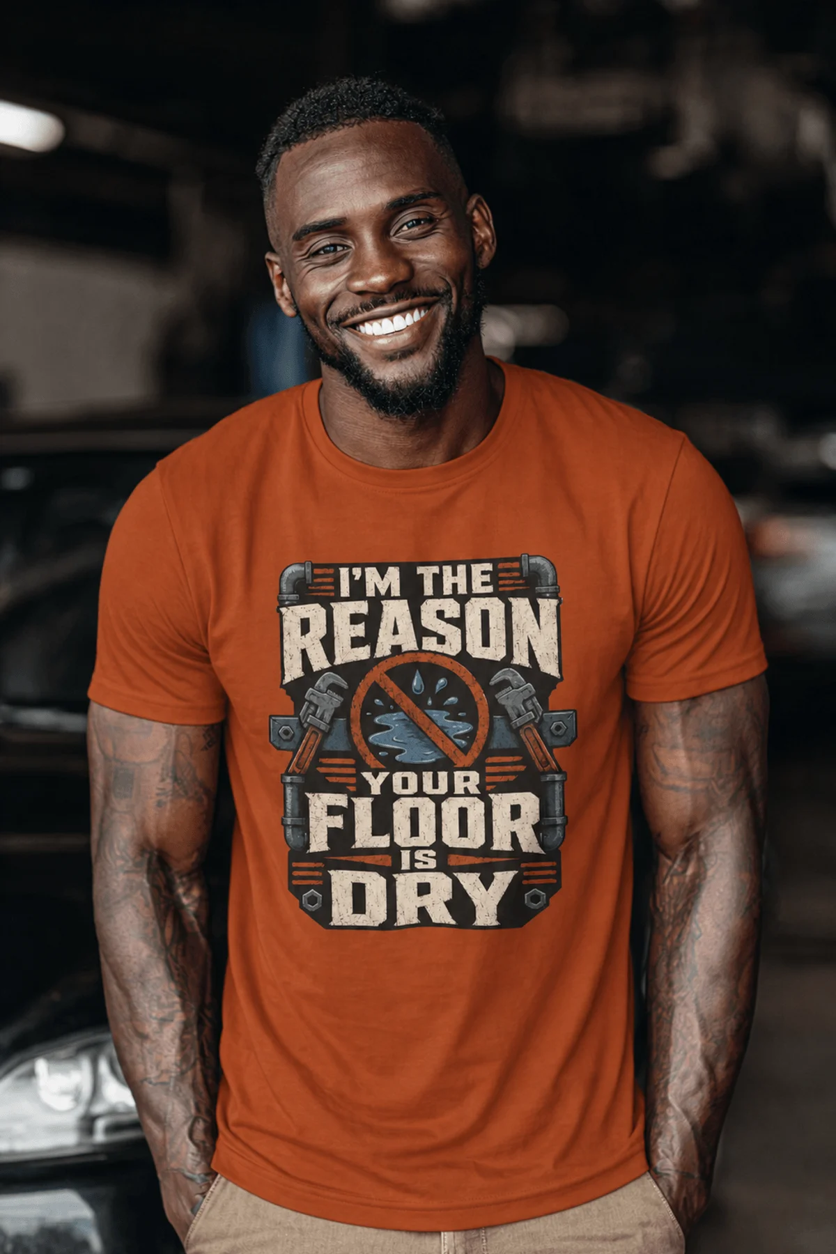 Plumber T‑Shirt – "I'm the Reason Your Floor Is Dry" Vintage Plumbing Tee — autumn — Model Plumber T‑Shirt – "I'm the Reason Your Floor Is Dry" Vintage Plumbing Tee — autumn t-shirt, model photo | Pressure Tested Co