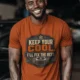 Funny HVAC Tee Shirt "Keep Your Cool. I'll Fix The Rest." T-Shirt – Vintage GraphicTee — autumn — Model Funny HVAC Tee Shirt "Keep Your Cool. I'll Fix The Rest." T-Shirt – Vintage GraphicTee — autumn t-shirt, model photo | Pressure Tested Co