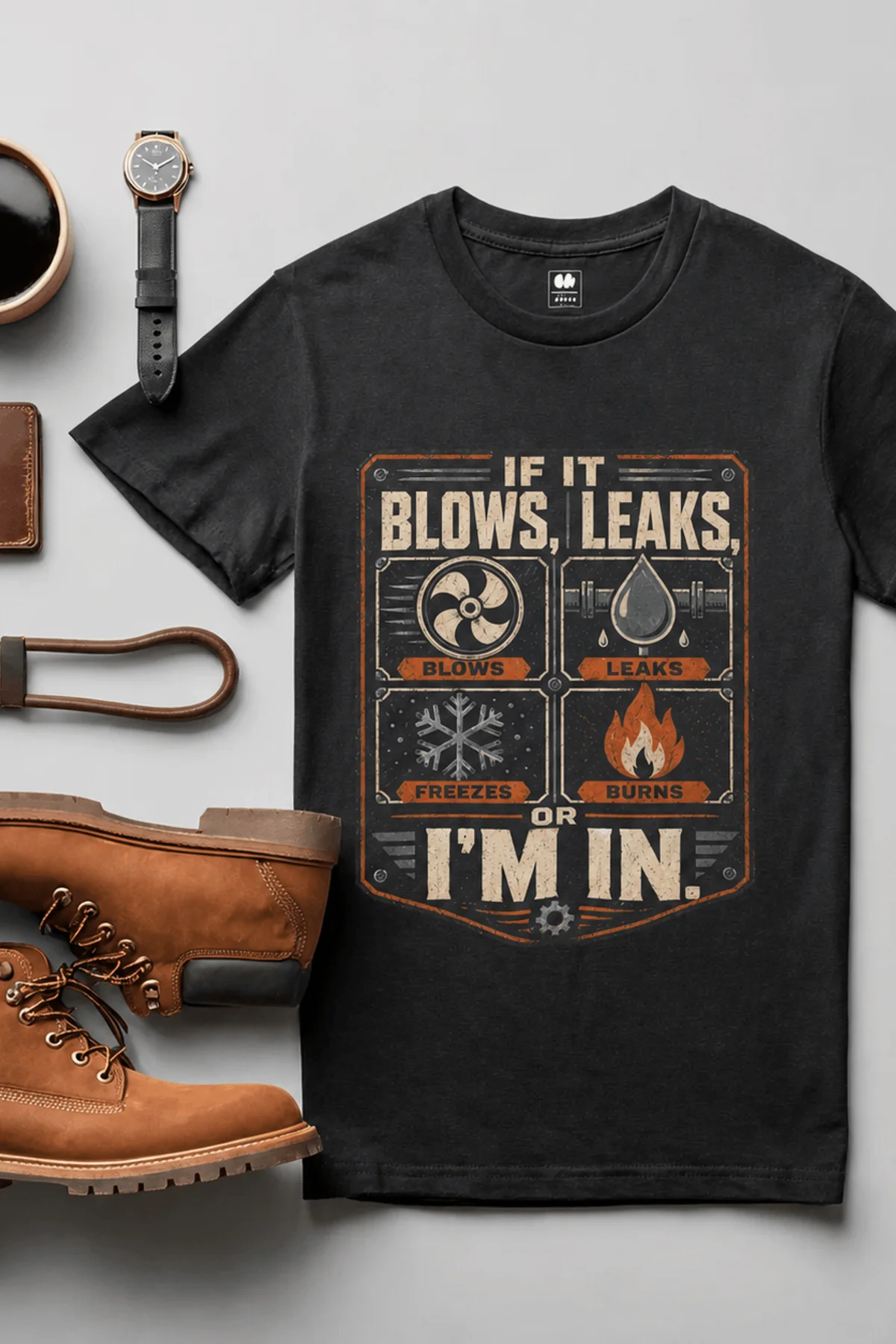 HVAC Technician T‑Shirt — "If It Blows, Leaks, Freezes or Burns I'm In" Retro Tradesmen Tee — black — Flat-lay HVAC Technician T‑Shirt — "If It Blows, Leaks, Freezes or Burns I'm In" Retro Tradesmen Tee — black t-shirt, flat-lay product photo | Pressure Tested Co