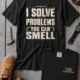 Funny Plumber Repair Graphic Tee "I Solve Problems You Can Smell" Back - "Plumbing Systems Diagnostician" Front — black — Flat-lay Funny Plumber Repair Graphic Tee "I Solve Problems You Can Smell" Back - "Plumbing Systems Diagnostician" Front — black t-shirt, flat-lay product photo | Pressure Tested Co