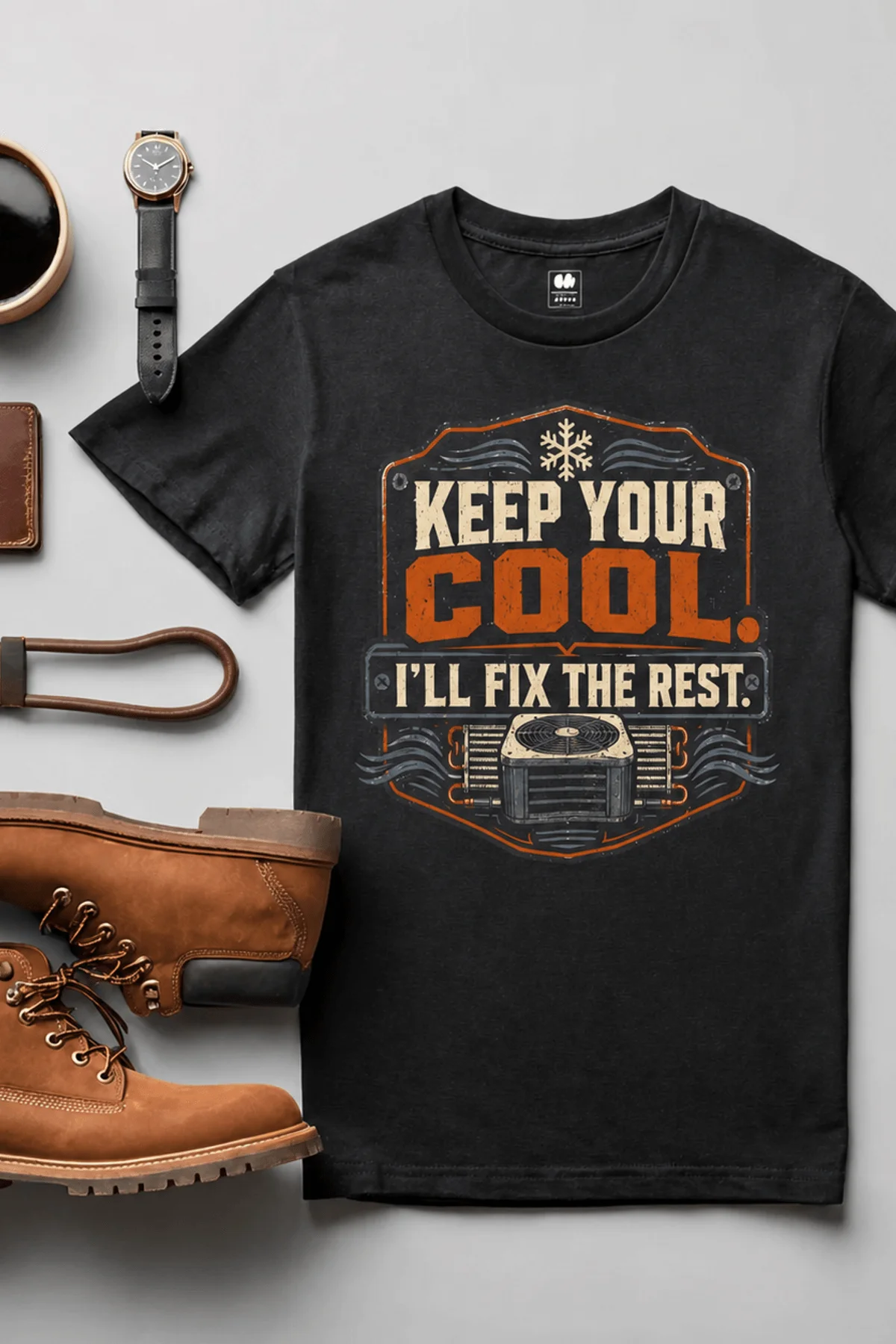 Funny HVAC Tee Shirt "Keep Your Cool. I'll Fix The Rest." T-Shirt – Vintage GraphicTee — black — Flat-lay Funny HVAC Tee Shirt "Keep Your Cool. I'll Fix The Rest." T-Shirt – Vintage GraphicTee — black t-shirt, flat-lay product photo | Pressure Tested Co