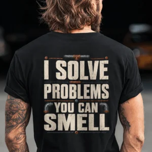 Funny Plumber Repair Graphic Tee "I Solve Problems You Can Smell" Back - "Plumbing Systems Diagnostician" Front — black t-shirt, model photo | Pressure Tested Co
