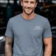Funny Plumber Repair Graphic Tee "I Solve Problems You Can Smell" Back - "Plumbing Systems Diagnostician" Front — blue-jean — Model Funny Plumber Repair Graphic Tee "I Solve Problems You Can Smell" Back - "Plumbing Systems Diagnostician" Front — blue-jean t-shirt, model photo | Pressure Tested Co