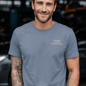 Funny Plumber Repair Graphic Tee "I Work Under Pressure" Back - "Plumbing Systems Diagnostician" Front — blue-jean t-shirt, model photo | Pressure Tested Co
