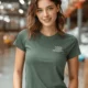Funny Plumber Repair Graphic Tee "I Solve Problems You Can Smell" Back - "Plumbing Systems Diagnostician" Front — blue-spruce — Model Funny Plumber Repair Graphic Tee "I Solve Problems You Can Smell" Back - "Plumbing Systems Diagnostician" Front — blue-spruce t-shirt, model photo | Pressure Tested Co