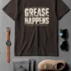 Grease Happens T-Shirt — Funny Mechanic Garage Tee — brown — Flat-lay Grease Happens T-Shirt — Funny Mechanic Garage Tee — brown t-shirt, flat-lay product photo | Pressure Tested Co