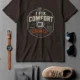 Funny HVAC Tech Tee "I Fix Comfort Crimes" — Furnace and Air Tech Work Tee — brown — Flat-lay Funny HVAC Tech Tee "I Fix Comfort Crimes" — Furnace and Air Tech Work Tee — brown t-shirt, flat-lay product photo | Pressure Tested Co