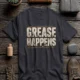 Grease Happens T-Shirt — Funny Mechanic Garage Tee — dark-grey — Flat-lay Grease Happens T-Shirt — Funny Mechanic Garage Tee — dark-grey t-shirt, flat-lay product photo | Pressure Tested Co