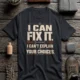 Sarcastic Mechanic T‑Shirt – "I Can Fix It. I Can't Explain Your Choices" Vintage Mechanic Shirt - DIY Repair Tee — dark-grey t-shirt, flat-lay product photo | Pressure Tested Co