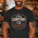 Funny HVAC Tech Tee "I Fix Comfort Crimes" — Furnace and Air Tech Work Tee — dark-grey — Model Funny HVAC Tech Tee "I Fix Comfort Crimes" — Furnace and Air Tech Work Tee — dark-grey t-shirt, model photo | Pressure Tested Co