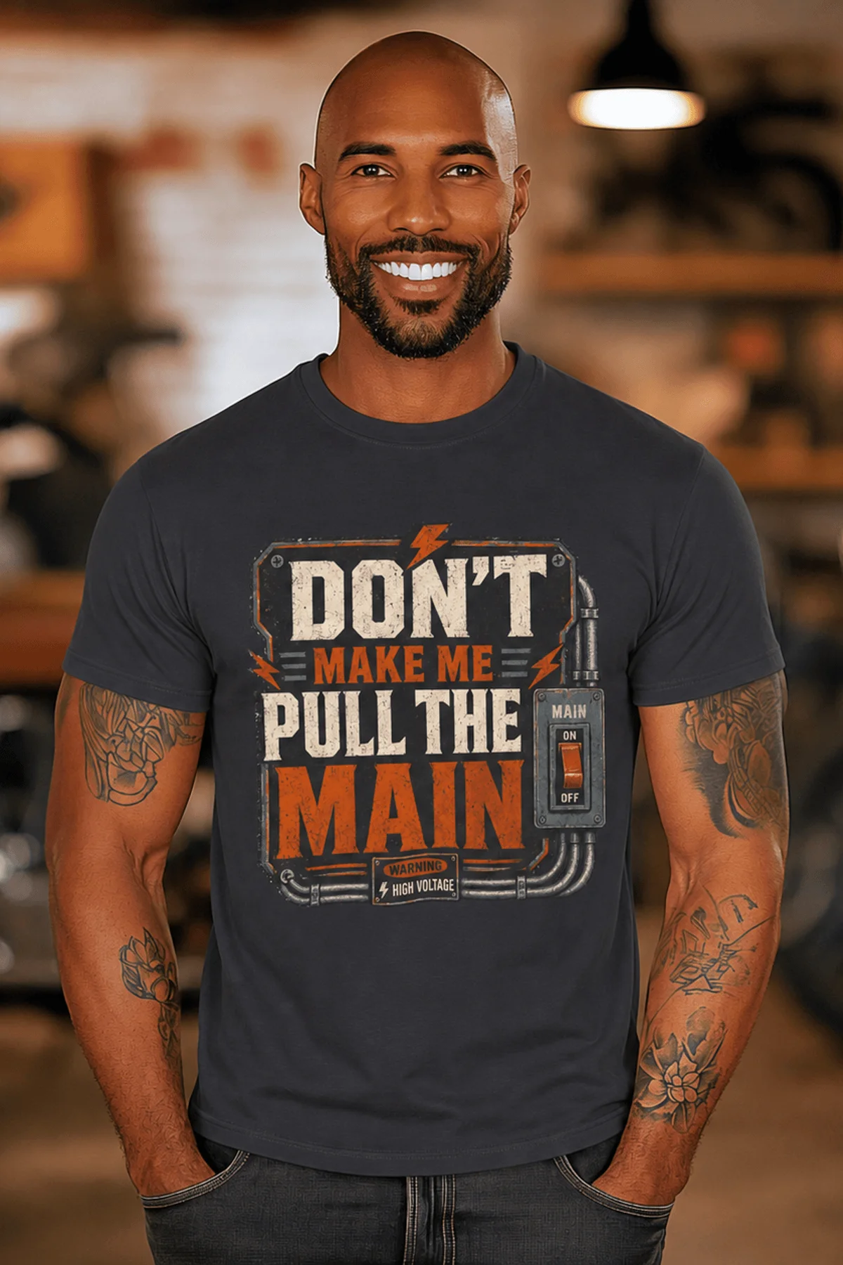 Funny Electrician/Maintenance Crew Tee Shirt "Don't Make Me Pull The Main" T-Shirt – Vintage GraphicTee — dark-grey — Model Funny Electrician/Maintenance Crew Tee Shirt "Don't Make Me Pull The Main" T-Shirt – Vintage GraphicTee — dark-grey t-shirt, model photo | Pressure Tested Co
