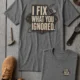 I Fix What You Ignored T-Shirt — Mechanic Wrench Tool Shirt for Technicians & DIYers — deep-heather — Flat-lay I Fix What You Ignored T-Shirt — Mechanic Wrench Tool Shirt for Technicians & DIYers — deep-heather t-shirt, flat-lay product photo | Pressure Tested Co