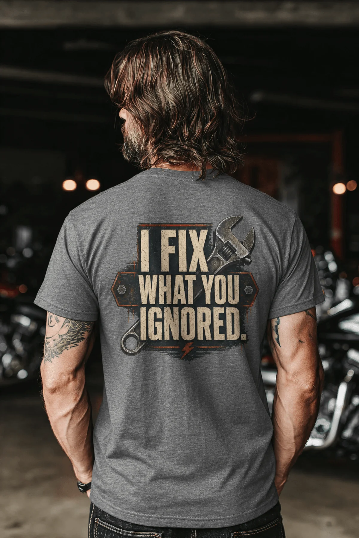 I Fix What You Ignored T-Shirt — Mechanic Wrench Tool Shirt for Technicians & DIYers — deep-heather — Model I Fix What You Ignored T-Shirt — Mechanic Wrench Tool Shirt for Technicians & DIYers — deep-heather t-shirt, model photo | Pressure Tested Co