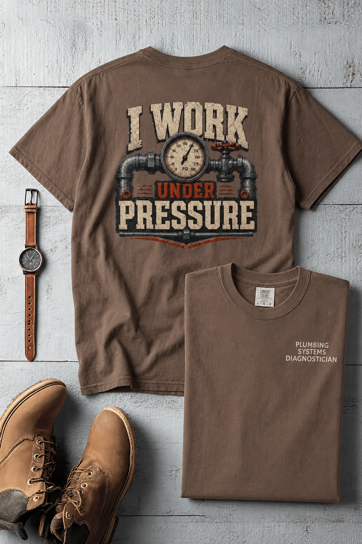 Funny Plumber Repair Graphic Tee "I Work Under Pressure" Back - "Plumbing Systems Diagnostician" Front — espresso t-shirt, flat-lay product photo | Pressure Tested Co