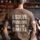Funny Plumber Repair Graphic Tee "I Solve Problems You Can Smell" Back - "Plumbing Systems Diagnostician" Front — espresso — Model Funny Plumber Repair Graphic Tee "I Solve Problems You Can Smell" Back - "Plumbing Systems Diagnostician" Front — espresso t-shirt, model photo | Pressure Tested Co