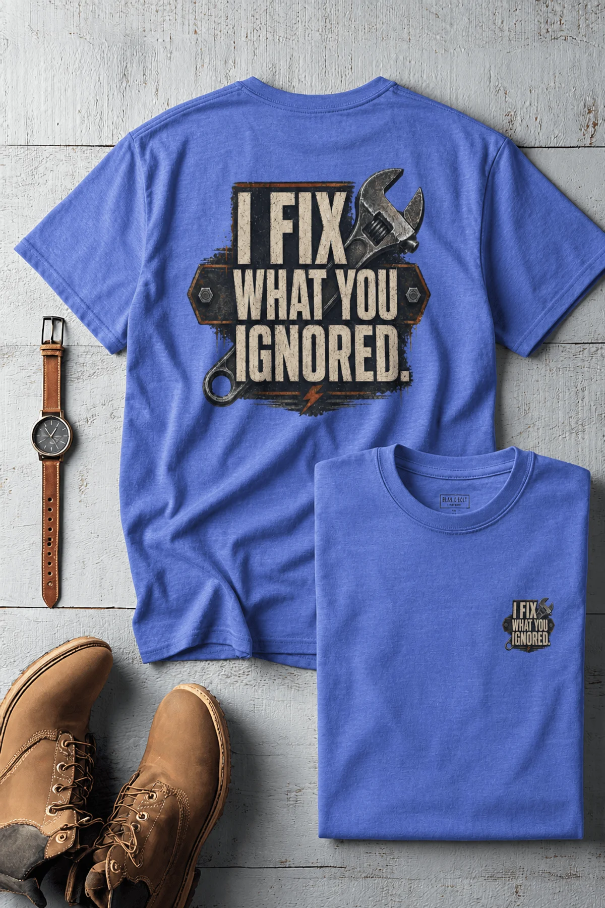 I Fix What You Ignored T-Shirt — Mechanic Wrench Tool Shirt for Technicians & DIYers — heather-columbia-blue — Flat-lay I Fix What You Ignored T-Shirt — Mechanic Wrench Tool Shirt for Technicians & DIYers — heather-columbia-blue t-shirt, flat-lay product photo | Pressure Tested Co