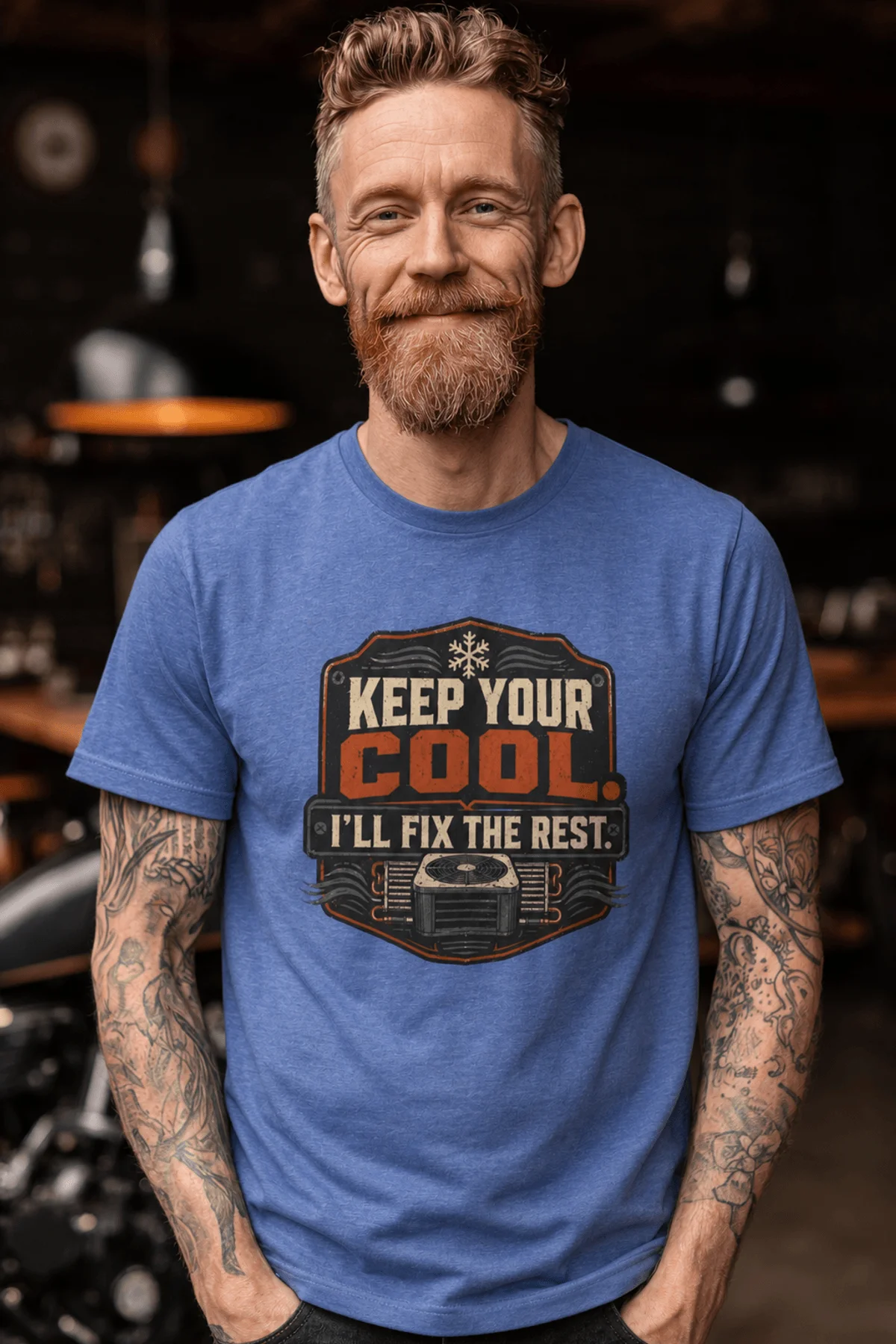 Funny HVAC Tee Shirt "Keep Your Cool. I'll Fix The Rest." T-Shirt – Vintage GraphicTee — heather-columbia-blue — Model Funny HVAC Tee Shirt "Keep Your Cool. I'll Fix The Rest." T-Shirt – Vintage GraphicTee — heather-columbia-blue t-shirt, model photo | Pressure Tested Co