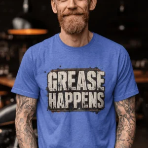 Grease Happens T-Shirt — Funny Mechanic Garage Tee — heather-columbia-blue t-shirt, model photo | Pressure Tested Co