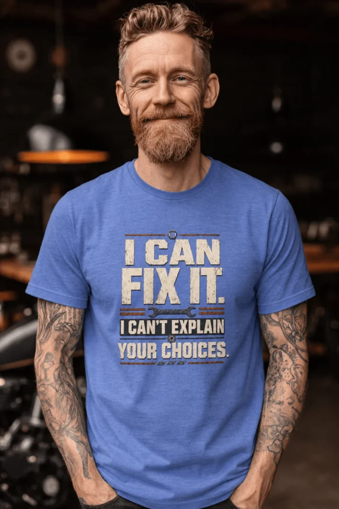 Sarcastic Mechanic T‑Shirt – "I Can Fix It. I Can't Explain Your Choices" Vintage Mechanic Shirt - DIY Repair Tee — heather-columbia-blue t-shirt, model photo | Pressure Tested Co