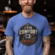 Funny HVAC Tech Tee "I Fix Comfort Crimes" — Furnace and Air Tech Work Tee — heather-columbia-blue — Model Funny HVAC Tech Tee "I Fix Comfort Crimes" — Furnace and Air Tech Work Tee — heather-columbia-blue t-shirt, model photo | Pressure Tested Co