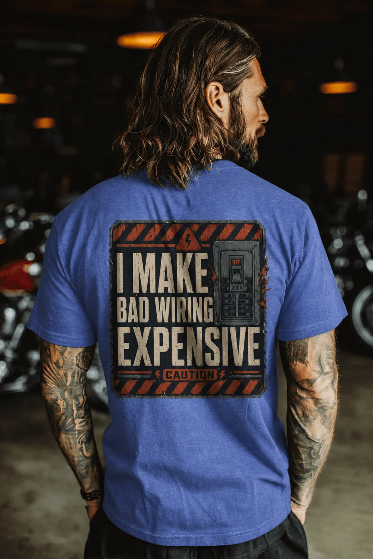 Funny Electrician Tech Tee - Back "I Make Bad Wiring Expensive" — Front "Wired For Success" Vintage Work Tee — heather-columbia-blue — Model Funny Electrician Tech Tee - Back "I Make Bad Wiring Expensive" — Front "Wired For Success" Vintage Work Tee — heather-columbia-blue t-shirt, model photo | Pressure Tested Co
