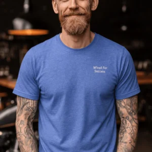 Funny Electrician Tech Tee - Back "I Make Bad Wiring Expensive" — Front "Wired For Success" Vintage Work Tee — heather-columbia-blue t-shirt, model photo | Pressure Tested Co