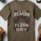 Plumber T‑Shirt – "I'm the Reason Your Floor Is Dry" Vintage Plumbing Tee — heather-olive — Flat-lay Plumber T‑Shirt – "I'm the Reason Your Floor Is Dry" Vintage Plumbing Tee — heather-olive t-shirt, flat-lay product photo | Pressure Tested Co