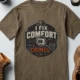 Funny HVAC Tech Tee "I Fix Comfort Crimes" — Furnace and Air Tech Work Tee — heather-olive — Flat-lay Funny HVAC Tech Tee "I Fix Comfort Crimes" — Furnace and Air Tech Work Tee — heather-olive t-shirt, flat-lay product photo | Pressure Tested Co