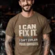 Sarcastic Mechanic T‑Shirt – "I Can Fix It. I Can't Explain Your Choices" Vintage Mechanic Shirt - DIY Repair Tee — heather-olive t-shirt, model photo | Pressure Tested Co