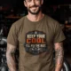 Funny HVAC Tee Shirt "Keep Your Cool. I'll Fix The Rest." T-Shirt – Vintage GraphicTee — heather-olive — Model Funny HVAC Tee Shirt "Keep Your Cool. I'll Fix The Rest." T-Shirt – Vintage GraphicTee — heather-olive t-shirt, model photo | Pressure Tested Co