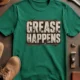 Grease Happens T-Shirt — Funny Mechanic Garage Tee — kelly — Flat-lay Grease Happens T-Shirt — Funny Mechanic Garage Tee — kelly t-shirt, flat-lay product photo | Pressure Tested Co