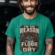 Plumber T‑Shirt – "I'm the Reason Your Floor Is Dry" Vintage Plumbing Tee — kelly — Model Plumber T‑Shirt – "I'm the Reason Your Floor Is Dry" Vintage Plumbing Tee — kelly t-shirt, model photo | Pressure Tested Co