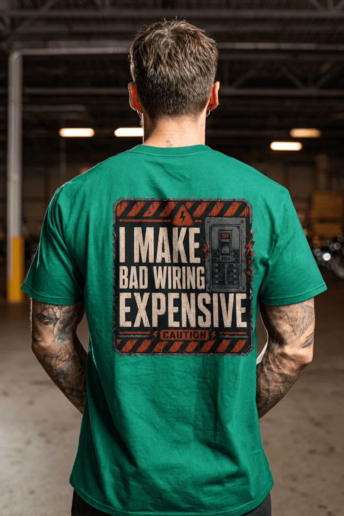 Funny Electrician Tech Tee - Back "I Make Bad Wiring Expensive" — Front "Wired For Success" Vintage Work Tee — kelly — Model Funny Electrician Tech Tee - Back "I Make Bad Wiring Expensive" — Front "Wired For Success" Vintage Work Tee — kelly t-shirt, model photo | Pressure Tested Co