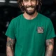 I Fix What You Ignored T-Shirt — Mechanic Wrench Tool Shirt for Technicians & DIYers — kelly — Model I Fix What You Ignored T-Shirt — Mechanic Wrench Tool Shirt for Technicians & DIYers — kelly t-shirt, model photo | Pressure Tested Co