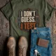I Don't Guess I Test T-Shirt — Funny Tech Tee for Engineers and Electricians — military-green — Flat-lay I Don't Guess I Test T-Shirt — Funny Tech Tee for Engineers and Electricians — military-green t-shirt, flat-lay product photo | Pressure Tested Co