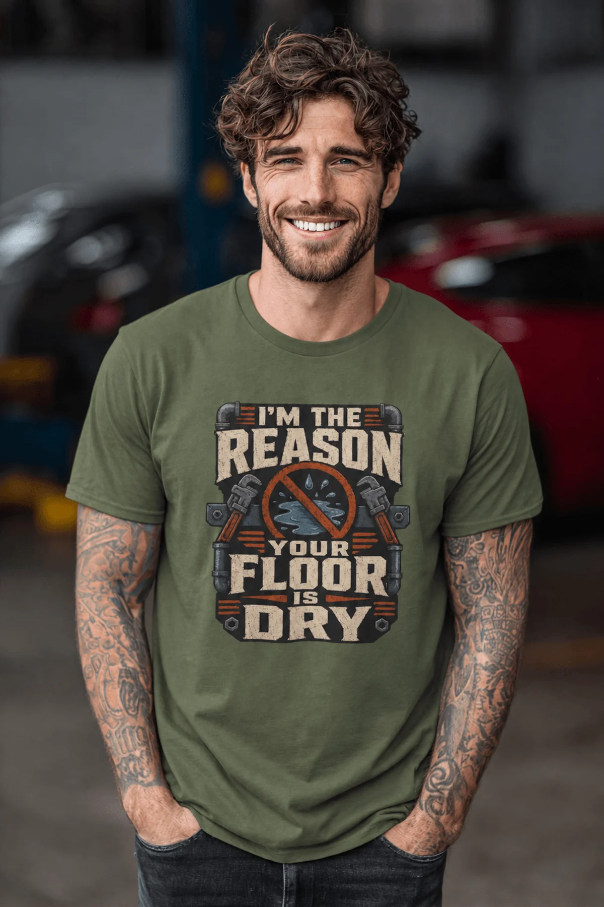 Plumber T‑Shirt – "I'm the Reason Your Floor Is Dry" Vintage Plumbing Tee — military-green — Model Plumber T‑Shirt – "I'm the Reason Your Floor Is Dry" Vintage Plumbing Tee — military-green t-shirt, model photo | Pressure Tested Co