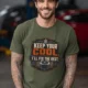 Funny HVAC Tee Shirt "Keep Your Cool. I'll Fix The Rest." T-Shirt – Vintage GraphicTee — military-green — Model Funny HVAC Tee Shirt "Keep Your Cool. I'll Fix The Rest." T-Shirt – Vintage GraphicTee — military-green t-shirt, model photo | Pressure Tested Co