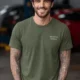 Funny Electrician Tech Tee - Back "I Make Bad Wiring Expensive" — Front "Wired For Success" Vintage Work Tee — military-green — Model Funny Electrician Tech Tee - Back "I Make Bad Wiring Expensive" — Front "Wired For Success" Vintage Work Tee — military-green t-shirt, model photo | Pressure Tested Co