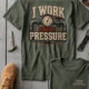 Funny Plumber Repair Graphic Tee "I Work Under Pressure" Back - "Plumbing Systems Diagnostician" Front — moss t-shirt, flat-lay product photo | Pressure Tested Co