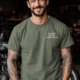 Funny Plumber Repair Graphic Tee "I Solve Problems You Can Smell" Back - "Plumbing Systems Diagnostician" Front — moss — Model Funny Plumber Repair Graphic Tee "I Solve Problems You Can Smell" Back - "Plumbing Systems Diagnostician" Front — moss t-shirt, model photo | Pressure Tested Co
