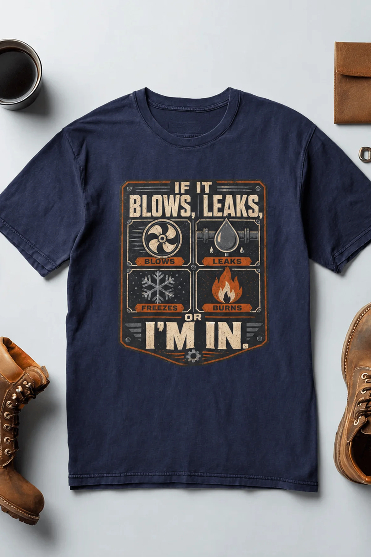 HVAC Technician T‑Shirt — "If It Blows, Leaks, Freezes or Burns I'm In" Retro Tradesmen Tee — navy — Flat-lay HVAC Technician T‑Shirt — "If It Blows, Leaks, Freezes or Burns I'm In" Retro Tradesmen Tee — navy t-shirt, flat-lay product photo | Pressure Tested Co