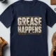 Grease Happens T-Shirt — Funny Mechanic Garage Tee — navy — Flat-lay Grease Happens T-Shirt — Funny Mechanic Garage Tee — navy t-shirt, flat-lay product photo | Pressure Tested Co
