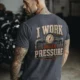 Funny Plumber Repair Graphic Tee "I Work Under Pressure" Back - "Plumbing Systems Diagnostician" Front — navy t-shirt, model photo | Pressure Tested Co