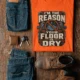 Plumber T‑Shirt – "I'm the Reason Your Floor Is Dry" Vintage Plumbing Tee — orange — Flat-lay Plumber T‑Shirt – "I'm the Reason Your Floor Is Dry" Vintage Plumbing Tee — orange t-shirt, flat-lay product photo | Pressure Tested Co