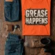 Grease Happens T-Shirt — Funny Mechanic Garage Tee — orange — Flat-lay Grease Happens T-Shirt — Funny Mechanic Garage Tee — orange t-shirt, flat-lay product photo | Pressure Tested Co